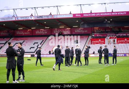 Boreham Wood players and staff inspect the pitch before the Emirates FA Cup fourth round match at the Vitality Stadium, Bournemouth. Picture date: Sunday February 6, 2022. Stock Photo