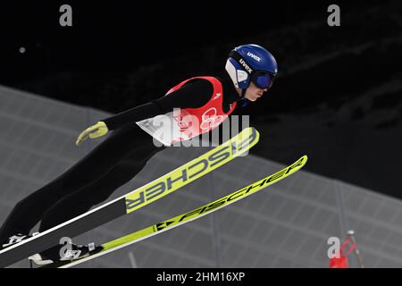 Zhangjiakou, China's Hebei Province. 6th Feb, 2022. Yevhen Marusiak of Ukraine competes during Ski Jumping Men's Normal Hill Individual 1st Round at the National Ski Jumping Centre in Zhangjiakou, north China's Hebei Province, Feb. 6, 2022. Credit: Feng Kaihua/Xinhua/Alamy Live News Stock Photo