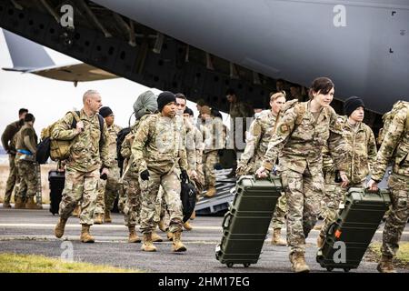 These are the first of 2,000 Soldiers to arrive in Europe following the Pentagon's announcement of additional forces moving from the United States to Europe in support of our NATO allies. The XVIII Airborne Corps, which serves as America's Contingency Corps, will provide a Joint Task Force-capable headquarters in Germany, as 1,700 Paratroopers from the 82nd Airborne Division deploy to Poland. These moves are designed to respond to the current security environment and reinforce NATO's eastern flank. Photo by Spc. Joshua Cowden/U.S. Army/UPI Stock Photo