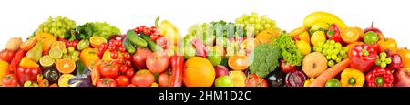 Wide panoramic composition of ripe, juicy fruits and vegetables isolated on white background. Stock Photo