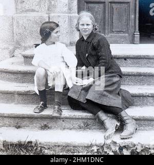 Family ambum of a wealthy young Swiss girl during her summer holidays. Her with a friend in Trient, Switzerland (1912) Stock Photo