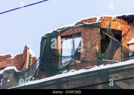 dilapidated housing emergency demolition after fire old city Stock Photo