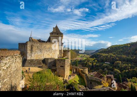 Castelnaud-la-Chapelle, France - November 1, 2021: the medieval fortress of Castelnaud in Perigord, France, taken on a partly sunny autumn afternoon w Stock Photo