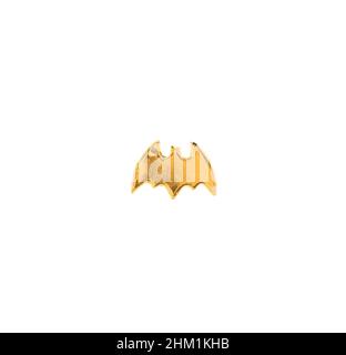 Golden plastic bat man icon. Isolated on a white background. Stock Photo
