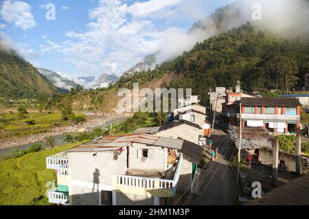 Beautiful village in western Nepal with Dhaulagiri Himal Stock Photo