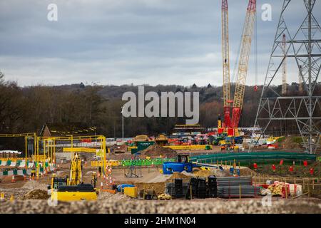 Harefield, UK. 5th February, 2022. A view of works for the HS2 high-speed rail link in the Colne Valley. A viaduct requiring 292 piles driven into the aquifer, a natural water filtration system, is currently being constructed to carry HS2 across lakes and watercourses in the Colne Valley Regional Park. Credit: Mark Kerrison/Alamy Live News Stock Photo