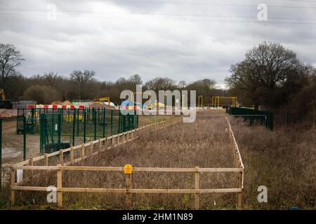 Harefield, UK. 5th February, 2022. A view of works for the HS2 high-speed rail link in the Colne Valley. A viaduct requiring 292 piles driven into the aquifer, a natural water filtration system, is currently being constructed to carry HS2 across lakes and watercourses in the Colne Valley Regional Park. Credit: Mark Kerrison/Alamy Live News Stock Photo