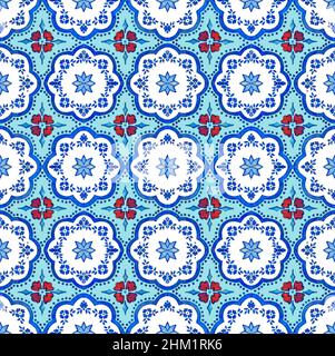 Close-up of a hand painted Portuguese azulejos style ornamental ceramic tile design. Blue, turquoise, white and red colors. Seamless pattern. Stock Photo