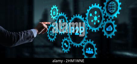 Businessman presses button p2p peer-to-peer on virtual interface. Stock Photo