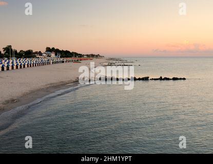 Sunset On The Beach In Groemitz Germany On A Beautiful Sunny Summer Day With A Clear Blue Sky And A Few Clouds Stock Photo