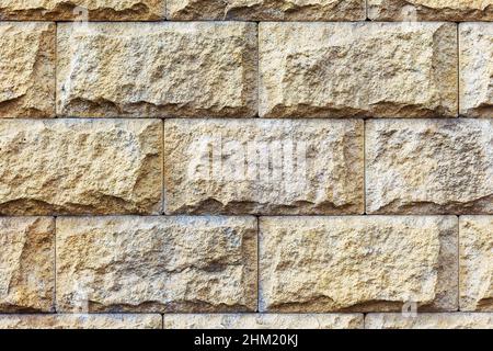 Stone wall background. Background of stone wall of boulders. Landscape style. Great background or texture. Stock Photo