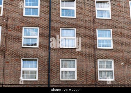 A older style brick block of flats for council social housing in the East End of London. UK. Stock Photo