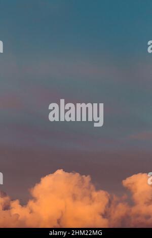 Colorful pastel toned clouds background Stock Photo