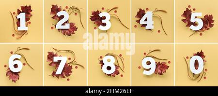 Numbers one to ten and zero with red autumn oak leaves and confetti on yellow paper background Stock Photo