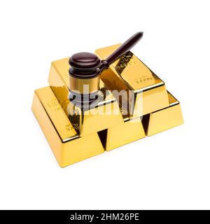 gold bars with auction gavel Stock Photo