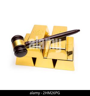 gold bars with judge gavel on white Stock Photo