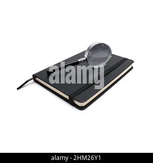 closed black notebook with magnifying glass on white Stock Photo