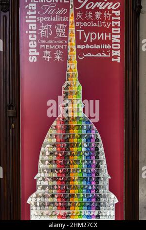 Close-up of a shop window with the typical tartufo chocolates in a display in the shape of the Mole Antonelliana, symbol of Turin, Piedmont, Italy Stock Photo