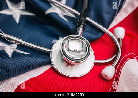 Close-up Photo Of Stethoscope On American Flag Stock Photo