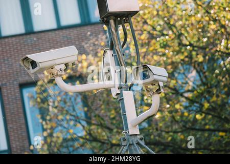 Security cctv surveillance cameras in the city concept for counter-terrorism, protesters, antiterrorism and protection from crime Stock Photo