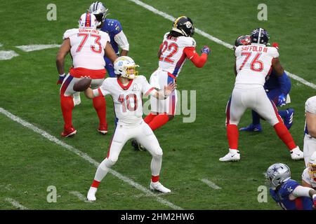 AFC safety Derwin James of the Los Angeles Chargers (33) and AFC  quarterback Justin Herbert of the Los Angeles Chargers (10) interact with  fans during Pro Bowl NFL football practice, Saturday, February