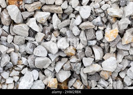 Natural abstract background with black crushed stone construction materials. gray granite chips Stock Photo