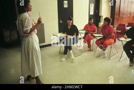 Austin, Texas USA  1992: Female instructor leads remedial writing and reading class for female inmates at the Travis County Jail.  No model releases available.  ©Bob Daemmrich Stock Photo