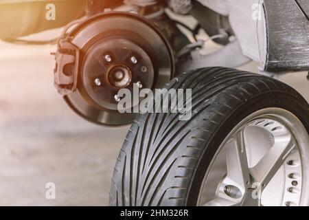 car tire with front wheel disc brake system in modern vehicle Stock Photo