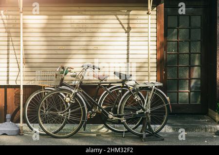 vintage bicycle parking at the street in Japan Stock Photo