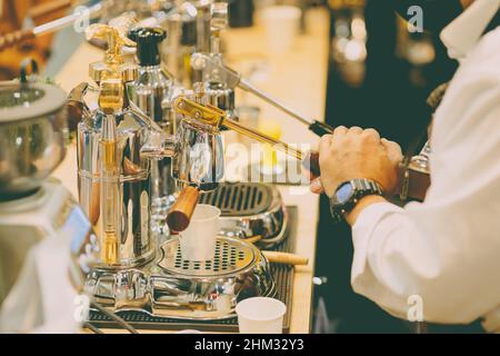 Espresso machine, glasses, Latte Macchiato, detail, coffeemaker, coffee,  espresso, in Italian, chrome, brightness, brilliantly, freshly, brew up,  layers, hand lever device, hand lever, coffee consumption, caffeine,  caffeine-containing Stock Photo - Alamy