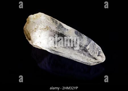 White Quartz stone isolated on black reflective background Stock Photo