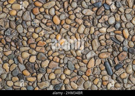 Colorful round pebble stone texture for wallpaper and background. Abstract background. Texture background. Macro photography. Close up Stock Photo