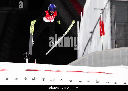 ZHANGJIAKOU, CHINA - FEBRUARY 6, 2022 - Ukrainian ski jumper Yevhen Marusiak partakes in the Men's Normal Hill Individual events at the Zhangjiakou Na Stock Photo