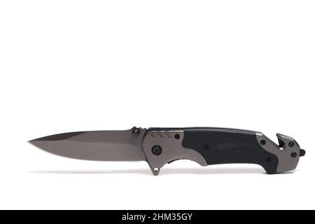 Tactical folding knife on white background, isolated Stock Photo
