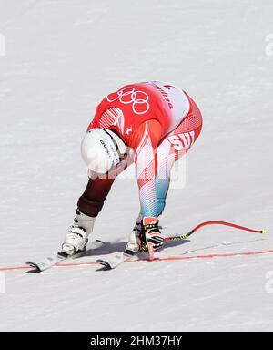 Beijing, China. 7th Feb, 2022. Beat Feuz of Switzerland passes the finish line during the Alpine Skiing Men's Downhill at the National Alpine Skiing Centre in Yanqing District, Beijing, capital of China, Feb. 7, 2022. Credit: Chen Bin/Xinhua/Alamy Live News Stock Photo