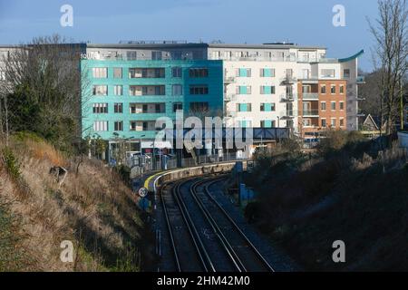 Dorchester, Dorset, UK.  7th February 2022.  UK Weather.  General view of Dorchester South railway station in Dorset with a view of the Brewery Square development on a morning of warm hazy sunshine.  Picture Credit: Graham Hunt/Alamy Live News Stock Photo