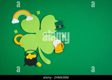 St. Patrick's Day. Banner design with shamrock leaf and typical St. Patrick's Day decorations. Copy space. Stock Photo