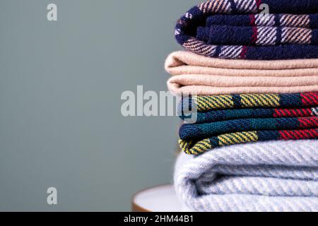 Stack of woolen checked blankets Stock Photo