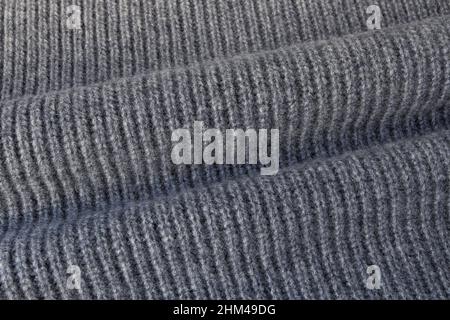Dark heather grey wool and cachemire scarf fabric texture swatch with soft folds Stock Photo