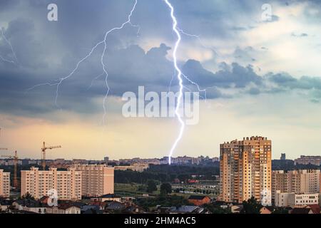Thunderstorm and lightning over city Stock Photo