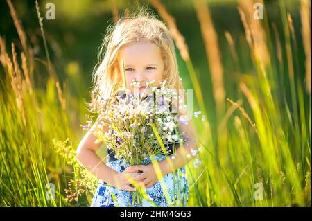 Little Girl In Swimming Hat And Pink Rash Top Playing In Wet Sand With  Ocean In Background (selective Focus) Stock Photo, Picture and Royalty Free  Image. Image 71913939.