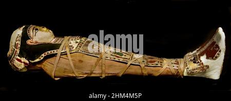 Egyptian mummy of a baby and painted cartonnage funereal mask- Late Ptolomaic Roman Period, 1at cent BC to 2 cent AD.  Egypt (Museo Egizio di Torino Italy) Stock Photo