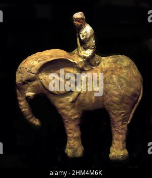 Statuette of a man riding an elephant,  Baked clay, x 15 x 5 cm,  332–30 BC,  Ptolemaic Period,  Tebtynis, Egypt (Museo Egizio di Torino Italy) Stock Photo