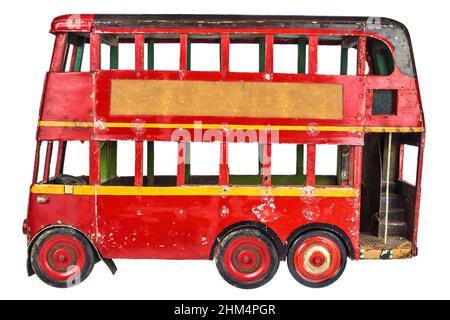 Vintage red English London bus toy isolated on a white background Stock Photo