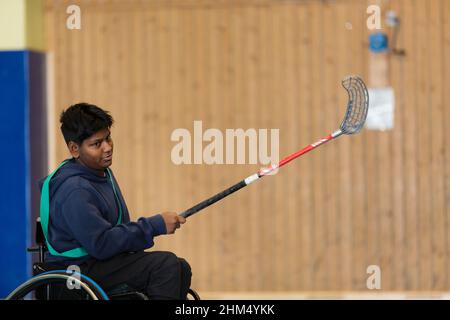 Disabled young man in gym Stock Photo