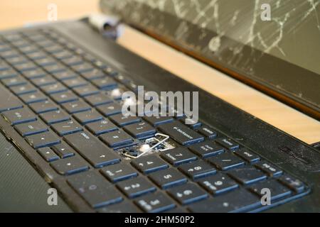 A close up of a broken computer keyboard. Stock Photo