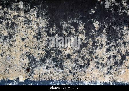 Close up of faded blue paint on a metal surface Stock Photo