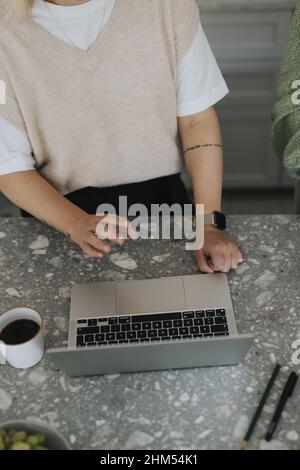 Woman using laptop Stock Photo