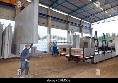 Man working in industrial warehouse Stock Photo
