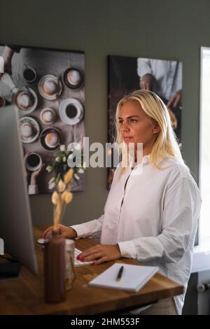 Woman using PC computer Stock Photo